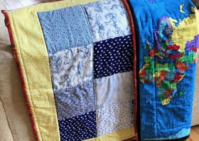 Joyce Donaldson - Baby Quilt with Map of the World back